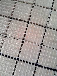 Mesh on reverse of a mosaic sheet