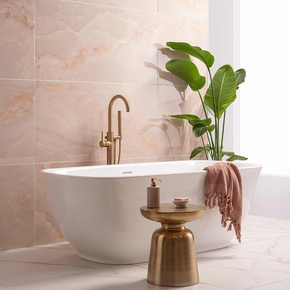 Marble effect tiles are typically white with black, grey or beige veins but if you prefer a softer look, why not think pink?