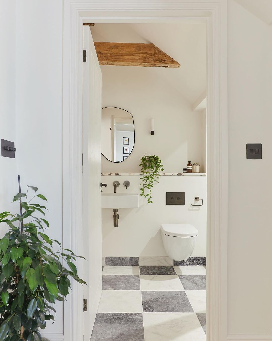 An iconic design, the checkerboard floor pattern is synonymous with elegance and luxury.