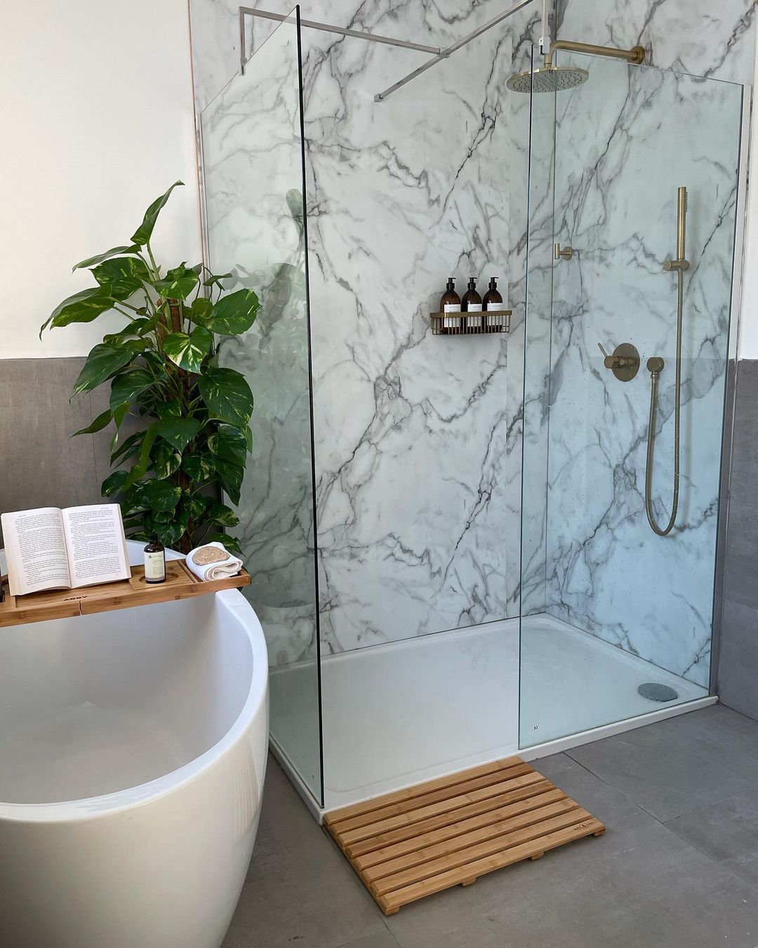 If you’re on a budget, or just want to introduce a small amount of marble to your bathroom, tiling the shower area in classy marble effect tiles is a savvy solution.